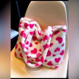 Pink and white heart shaped bag